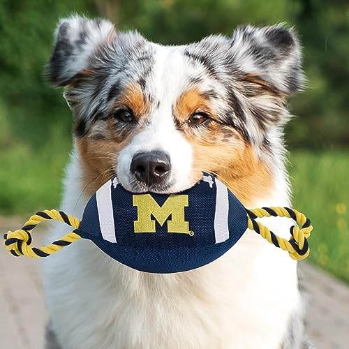 Pets First NCAA Michigan Wolverines Football Dog Toy, Tough Quality Nylon Materials, Strong Pull Ropes, Inner Squeaker, Collegiate Team Color