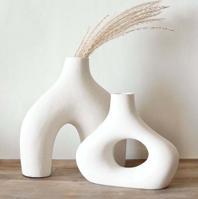 Carrot's Den Ceramic Modern Vase Set of 2, Donut Shelf Decor, Warm White | Matte pair for bookshelf and bookcase decor, mantel styling, or home staging. Holds dried stems and faux plants indoor.