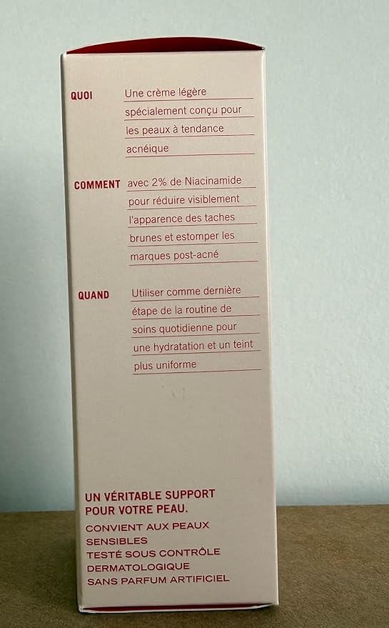 First Aid Beauty Lactic Acid Lotion for Acne-Prone Skin with 2% Niacinamide - Resurfacing Lotion Moisturizes & Visibly Diminishes Post-Acne Marks, (1.0 oz)
