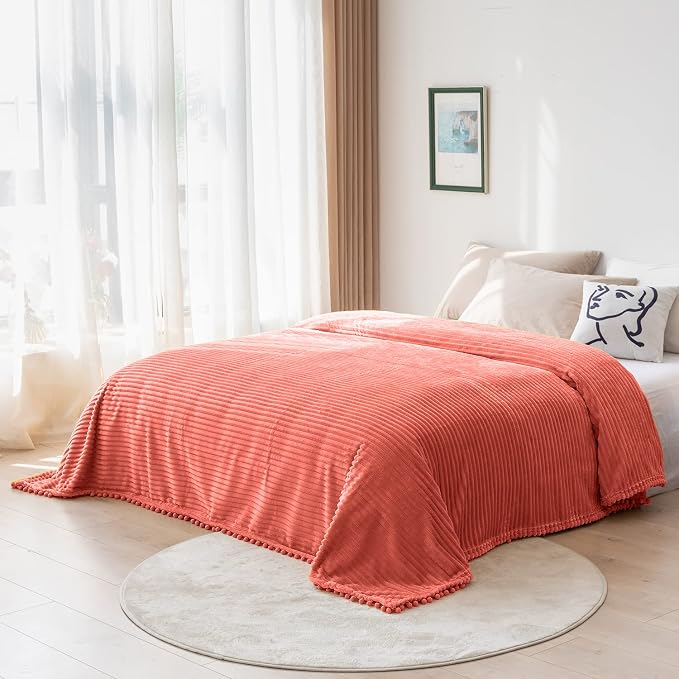 DISSA Fleece Blanket Twin Size – 60x80, Coral - Soft, Plush, Fluffy, Fuzzy, Warm, Cozy – Perfect Throw for Couch, Bed, Sofa - with Pompom Fringe - Flannel Blanket