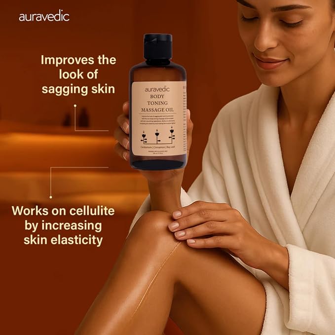 Auravedic Firming Toning Body Massage Oil | Helps Smooth Stretch Marks & Sagging Skin | Ayurvedic Blend with Cinnamon, Cardamom & Bay Leaf | for Thighs, Legs & Belly | 6.76 Fl Oz (200ml)