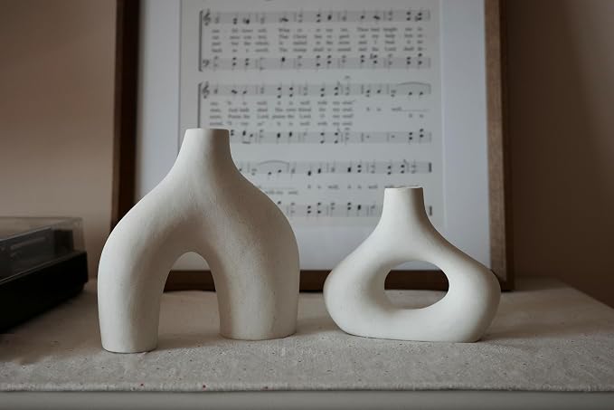 Carrot's Den Ceramic Modern Vase Set of 2, Donut Shelf Decor, Warm White | Matte pair for bookshelf and bookcase decor, mantel styling, or home staging. Holds dried stems and faux plants indoor.