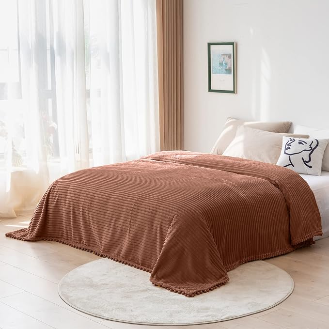DISSA Fleece Blanket Throw Size – 51x63, Caramel – Soft, Plush, Fluffy, Fuzzy, Warm, Cozy – Perfect Throw for Couch, Bed, Sofa - with Pompom Fringe - Flannel Blanket Throw Blanket