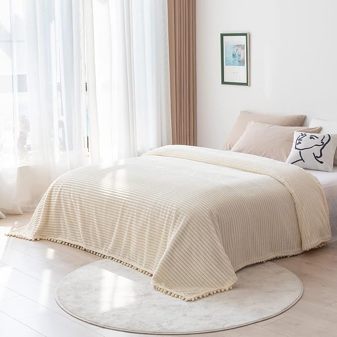DISSA Fleece Blanket Twin Size – 60x80, Beige - Soft, Plush, Fluffy, Fuzzy, Warm, Cozy – Perfect Throw for Couch, Bed, Sofa - with Pompom Fringe - Flannel Blanket