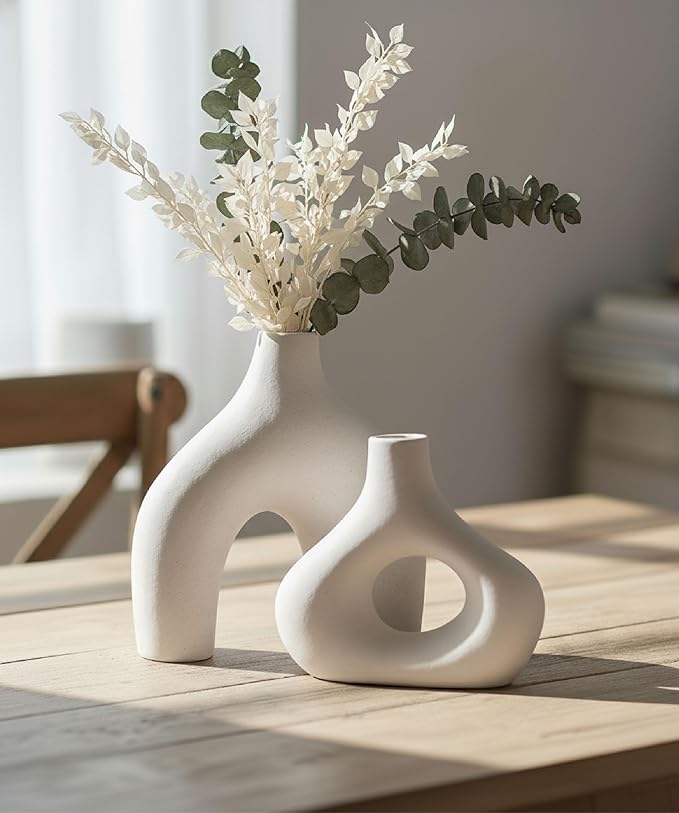 Carrot's Den Ceramic Modern Vase Set of 2, Donut Shelf Decor, Warm White | Matte pair for bookshelf and bookcase decor, mantel styling, or home staging. Holds dried stems and faux plants indoor.