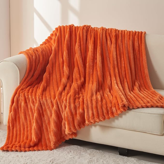 NEWCOSPLAY Fleece Ribbed Cozy Throw Blanket for Couch, Orange, 50"x60" | Premium Silky Flannel Blanket, Soft Lightweight Fluffy Throw Blanket for Bed Sofa Decor, Gift for All Season Use