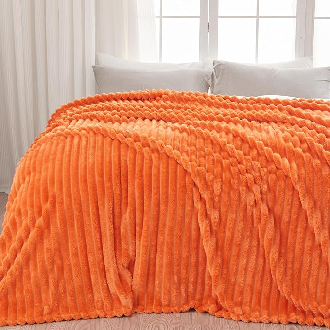 NEWCOSPLAY Fleece Ribbed Cozy Throw Blanket for Couch, Orange, 50"x60" | Premium Silky Flannel Blanket, Soft Lightweight Fluffy Throw Blanket for Bed Sofa Decor, Gift for All Season Use