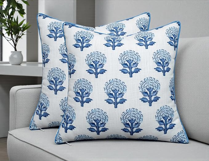Marigold Floral Print 20x20 Pillow Covers Set of 2, Blue | Blue marigold floral on off-white slub, blue piping; both sides printed; hidden zip; cover only